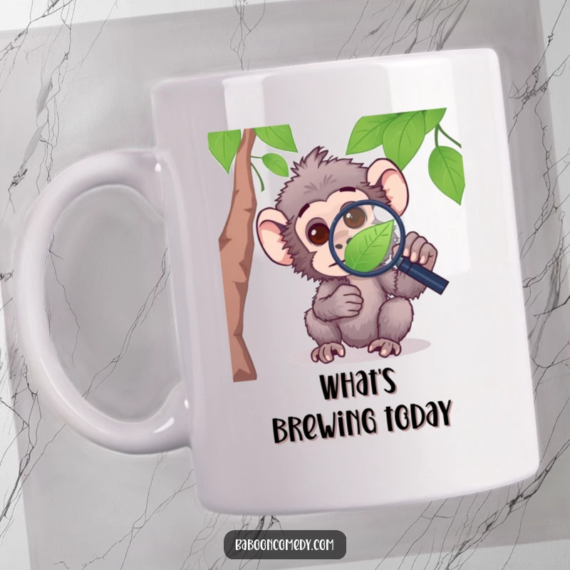 Funny mug featuring a curious baboon peering intently through a magnifying glass at a small leaf, exploring nature.