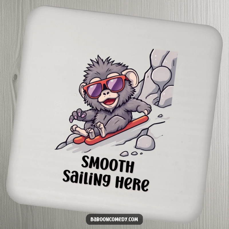 Funny kawaii baboon drink coaster, a primate wearing sunglasses sliding down a rocky slope, adding cool protection.