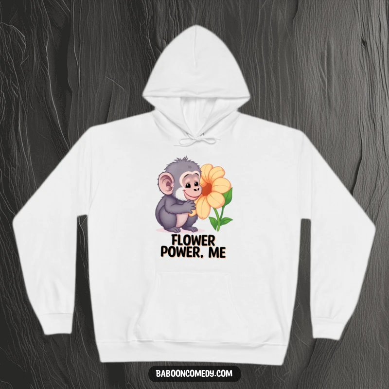 Funny Kawaii baboon hoodie, showing a curious primate gently examining a large, colorful flower with a sweet, content smile.