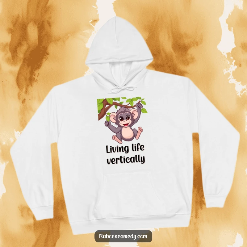 Funny hoodie with a design of a baboon with wide, ecstatic eyes, swinging dynamically from a vine.