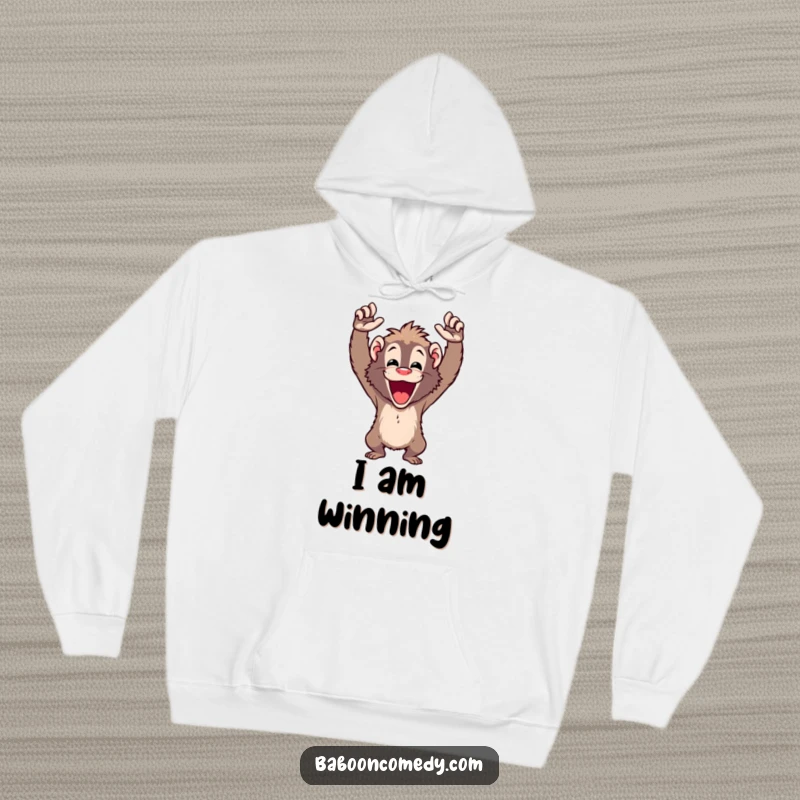 Funny cheering baboon hoodie showing a delighted ape with arms raised high, celebrating enthusiastically.