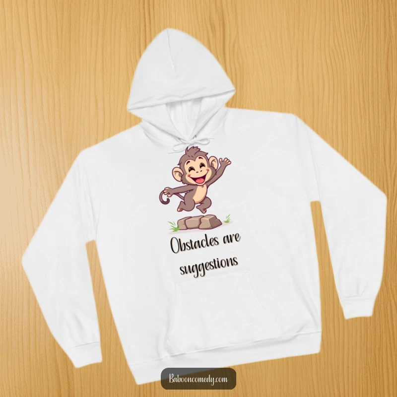 Funny hoodie featuring an energetic baboon leaping over a small obstacle with a wide grin, embodying primate power and humorous determination.