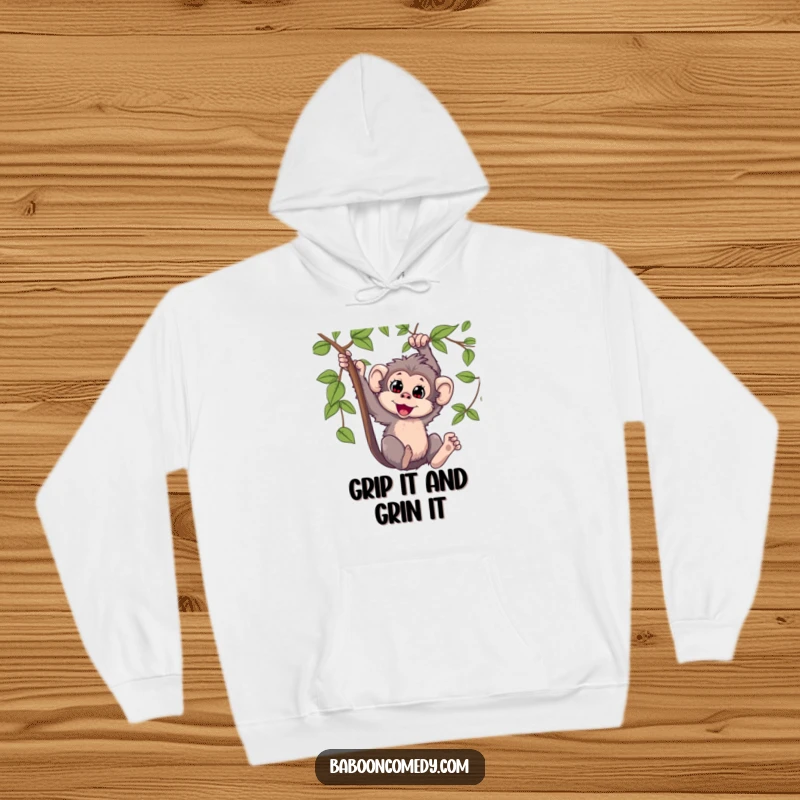 Funny Kawaii baboon hoodie, depicted mid-swing on a vine, expressing immense delight and playful abandon, a cozy and humorous garment.