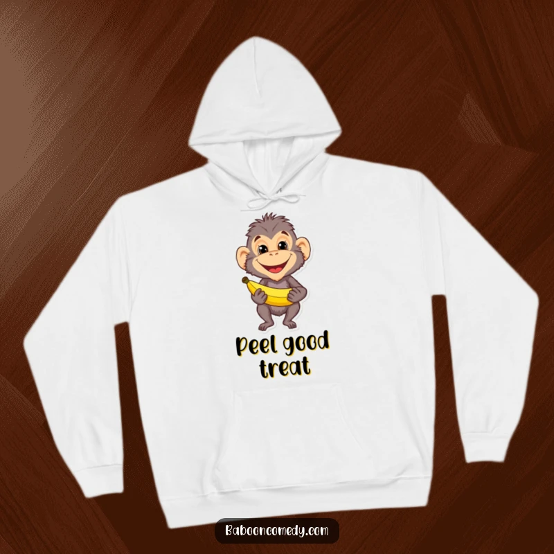 Funny baboon with a sly grin holding a banana, depicted on a comfortable hoodie. Perfect for chilly days and playful personalities.