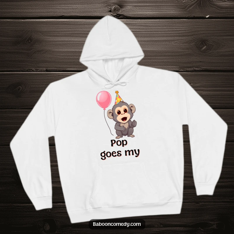 Funny hoodie featuring a surprised baboon sporting a party hat and holding a balloon, ready for a fun-filled event.