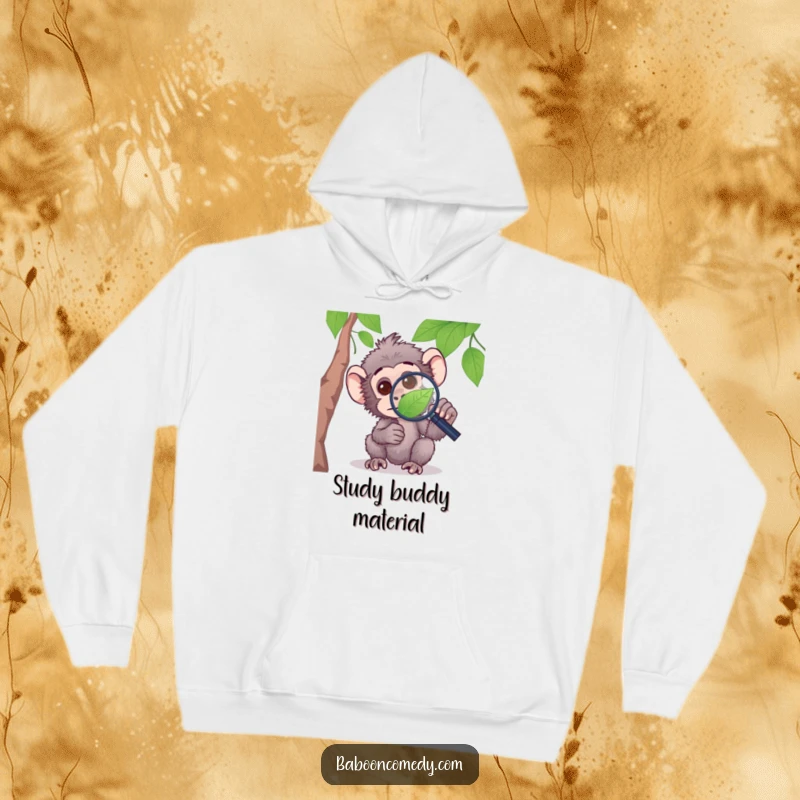 Funny hoodie featuring a curious baboon using a magnifying glass to examine a leaf, blending comfort with intellect.