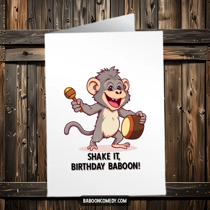 Funny Free Printable baboon birthday card, joyfully dancing with a drum and maracas, full of energetic celebration.