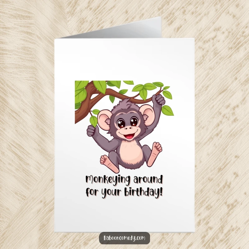Funny Free Printable Baboon Swinging Birthday Card: A baboon with wide eyes joyfully swings from a vine.