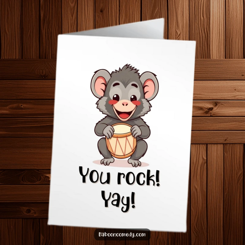 Funny Free Printable Congratulations Card featuring a smiling kawaii baboon enthusiastically playing a tiny drum.