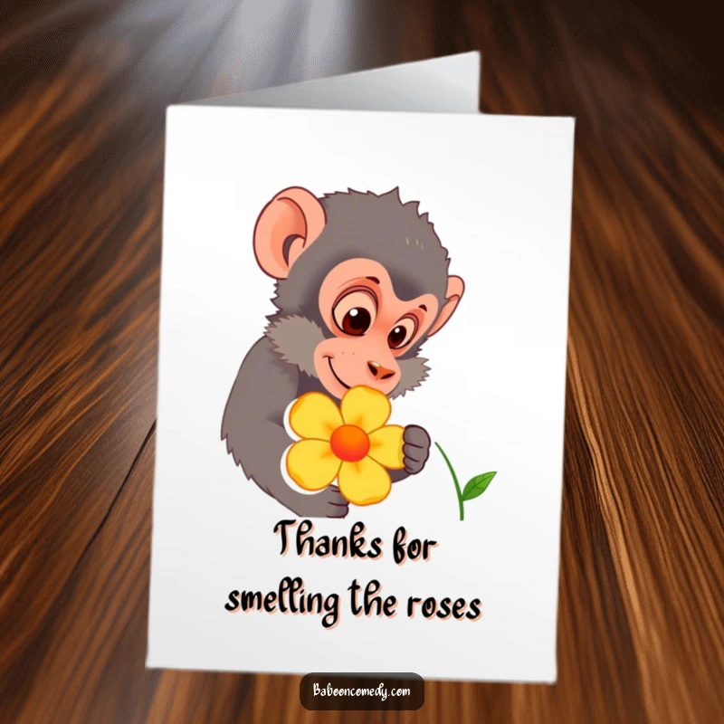 Funny Free Printable Baboon Thank You Card: A baboon looks closely at a bright flower, offering a sweet and curious thank you.