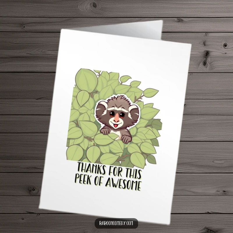 Funny Free Printable Thank You Card: A cheeky baboon hiding behind a bush, sending thanks with a sly grin.