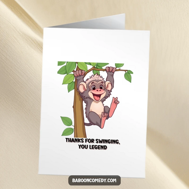 Funny Free Printable Baboon Thank You Card: Energetic baboon swinging from a vine, expressing thanks with vibrant enthusiasm.