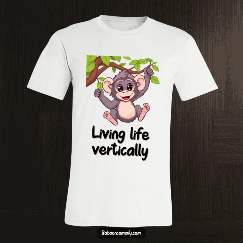 Funny t-shirt featuring a baboon with wide, excited eyes swinging happily from a lush green vine.