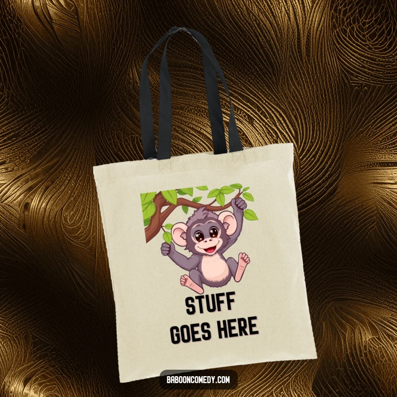 Funny tote bag featuring a baboon with wide, surprised eyes, gleefully swinging from a vine, full of motion.