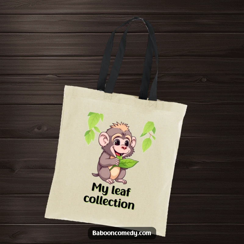 Funny tote bag showing a baboon happily munching on a green leaf, conveying a sense of peaceful enjoyment.